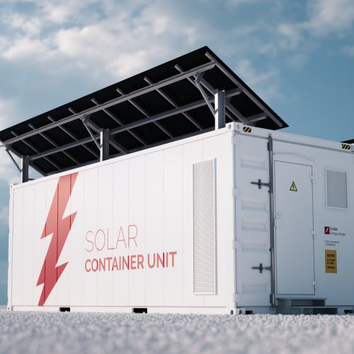 Solar container unit. 3d rendering concept of a white industrial battery energy storage container with mounted black solar panels situated on white gravel in empty landscape in sunny weather.